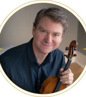 Anton Miller poses with a string instrument